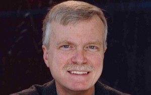 Headshot of John Wallace - REV Board