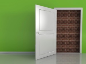 Open door with investment barrier behind