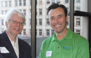Bruce Schmidt Vancouver Angel standing with Brent Sauder